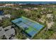 Aerial view of the community tennis and pickleball courts at 109 Woodland Pl, Osprey, FL 34229