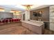 Clubhouse kitchen with a large island and dining area at 12667 Sorrento Way, Bradenton, FL 34211