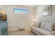 Inviting living area with comfortable seating, natural light, and stylish decor at 12667 Sorrento Way, Bradenton, FL 34211