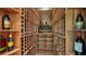 Extensive wine cellar with numerous bottles and wooden racking at 1430 Harbor Dr, Sarasota, FL 34239