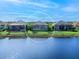 Waterfront property boasting a private backyard and tranquil lake views at 15407 Castle Park Ter, Lakewood Ranch, FL 34202