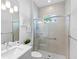 Modern bathroom with a walk-in shower and updated vanity at 15407 Castle Park Ter, Lakewood Ranch, FL 34202