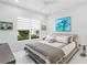 Spacious bedroom with large window and neutral decor at 15407 Castle Park Ter, Lakewood Ranch, FL 34202