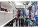Well-organized walk-in closet with custom shelving at 15407 Castle Park Ter, Lakewood Ranch, FL 34202