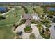 Aerial view of a clubhouse near a golf course at 15407 Castle Park Ter, Lakewood Ranch, FL 34202