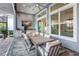 Outdoor dining area with seating and a view of the pool at 15407 Castle Park Ter, Lakewood Ranch, FL 34202