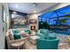 Relaxing outdoor living space with comfortable seating near the pool at 15407 Castle Park Ter, Lakewood Ranch, FL 34202