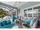 Cozy outdoor lounge area with lake views at 15407 Castle Park Ter, Lakewood Ranch, FL 34202