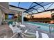 Expansive pool and patio area with lake views at 15407 Castle Park Ter, Lakewood Ranch, FL 34202