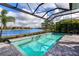 Inviting swimming pool with a tranquil lake view at 15407 Castle Park Ter, Lakewood Ranch, FL 34202