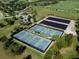 Aerial view of tennis and pickleball courts at 15407 Castle Park Ter, Lakewood Ranch, FL 34202