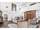 Spacious living room with a loft area, wood floors, and elegant furnishings at 1656 Hillview St, Sarasota, FL 34239