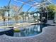 Inviting screened pool and spa with lake views at 19025 Fern Meadow Loop, Lutz, FL 33558