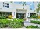 Exterior view of clubhouse at Fairway Bay at 1904 Harbourside Dr # 204, Longboat Key, FL 34228