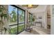 Light-filled common area with sliding glass doors leading to outside at 1904 Harbourside Dr # 204, Longboat Key, FL 34228