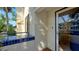 Private condo entry with tiled patio and exterior door at 1904 Harbourside Dr # 204, Longboat Key, FL 34228