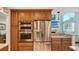 Updated kitchen with stainless steel appliances and wood cabinets at 1904 Harbourside Dr # 204, Longboat Key, FL 34228