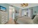 Serene bedroom with a king-size bed and sliding glass doors to balcony at 1904 Harbourside Dr # 204, Longboat Key, FL 34228