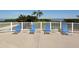Relaxing pool deck area with lounge chairs for sunbathing at 1904 Harbourside Dr # 204, Longboat Key, FL 34228