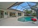 Enjoy this refreshing pool with a screened enclosure at 2077 Apalachee Ln, Nokomis, FL 34275