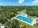 Large community pool surrounded by green space at 2419 Hillview St, Sarasota, FL 34239