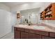 Bathroom featuring a double sink vanity, neutral countertops, and a shower at 2819 Greenleaf Ter, Parrish, FL 34219