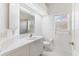 Bright bathroom featuring a vanity with ample counter space, and updated sink and faucet at 2960 Sandringham Pl, Sarasota, FL 34235