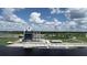 Spectacular water view near a modern building with recreation area, great for outdoor activities at 2960 Sandringham Pl, Sarasota, FL 34235