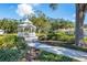 Charming community gazebo surrounded by lush greenery, perfect for relaxing and enjoying the outdoors at 2960 Sandringham Pl, Sarasota, FL 34235