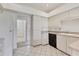 Clean and functional kitchen with white cabinetry and efficient layout at 2960 Sandringham Pl, Sarasota, FL 34235