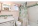 Simple bathroom with shower/tub combo and vanity at 3937 Lake Bayshore Dr # 401, Bradenton, FL 34205