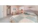 Inviting bedroom with a cottage flair, closet and adjacent bath at 3937 Lake Bayshore Dr # 401, Bradenton, FL 34205