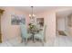 The dining room is open to the kitchen, and adjacent to the living room at 3937 Lake Bayshore Dr # 401, Bradenton, FL 34205