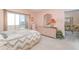 Main bedroom with view to the water, and ensuite bath at 3937 Lake Bayshore Dr # 401, Bradenton, FL 34205