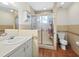 Clean bathroom with shower, toilet and vanity at 4204 128Th W St, Cortez, FL 34215