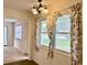 Bright dining area with floral curtains and window view at 4610 21St W St, Bradenton, FL 34207