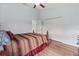 Spacious bedroom with ample closet space and wooden furniture at 4875 Wood Pointe Way, Sarasota, FL 34233