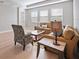 Light and airy living room with light brown sofas at 4877 Antrim Dr, Sarasota, FL 34240