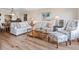 Spacious living room featuring hardwood floors and comfy furniture at 4900 Gulf Of Mexico Dr # 205, Longboat Key, FL 34228