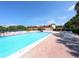 Refreshing community pool with lounge chairs at 4900 Gulf Of Mexico Dr # 205, Longboat Key, FL 34228