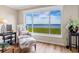 Relaxing sitting area with water views and comfortable seating at 4900 Gulf Of Mexico Dr # 205, Longboat Key, FL 34228