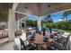 Enjoy outdoor dining with pool views at 518 Blue Heron Dr, Anna Maria, FL 34216