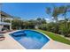 Resort-style pool with spa and lounge area at 518 Blue Heron Dr, Anna Maria, FL 34216