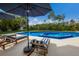 Inviting pool with spa and lounge chairs; perfect for relaxation at 518 Blue Heron Dr, Anna Maria, FL 34216