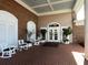 Clubhouse entrance with seating and brick at 5405 Fair Oaks St # 5405, Bradenton, FL 34203