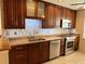 Updated kitchen featuring granite countertops and ample cabinetry at 5405 Fair Oaks St # 5405, Bradenton, FL 34203