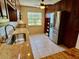 This kitchen features a stone countertop, stainless steel appliances, and wood cabinets at 5405 Fair Oaks St # 5405, Bradenton, FL 34203