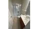 Bathroom with a shower, vanity sink, and toilet at 5467 Soapstone Pl # 203, Sarasota, FL 34233