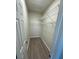 Spacious walk-in closet with built-in shelving at 5467 Soapstone Pl # 203, Sarasota, FL 34233
