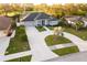 Single-Gathering home with circular driveway and palm tree at 566 Oak Bay Dr, Osprey, FL 34229